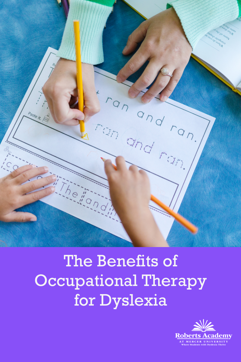 A child's hands practices handwriting by tracing letters on a worksheet while adult hands assist. Text on the image reads: The Benefits of Occupational Therapy for Dyslexia