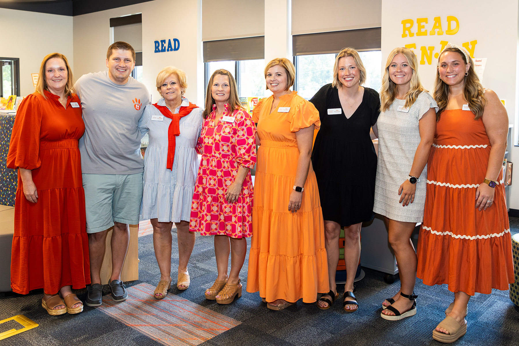 Group of staff members posing for a photo