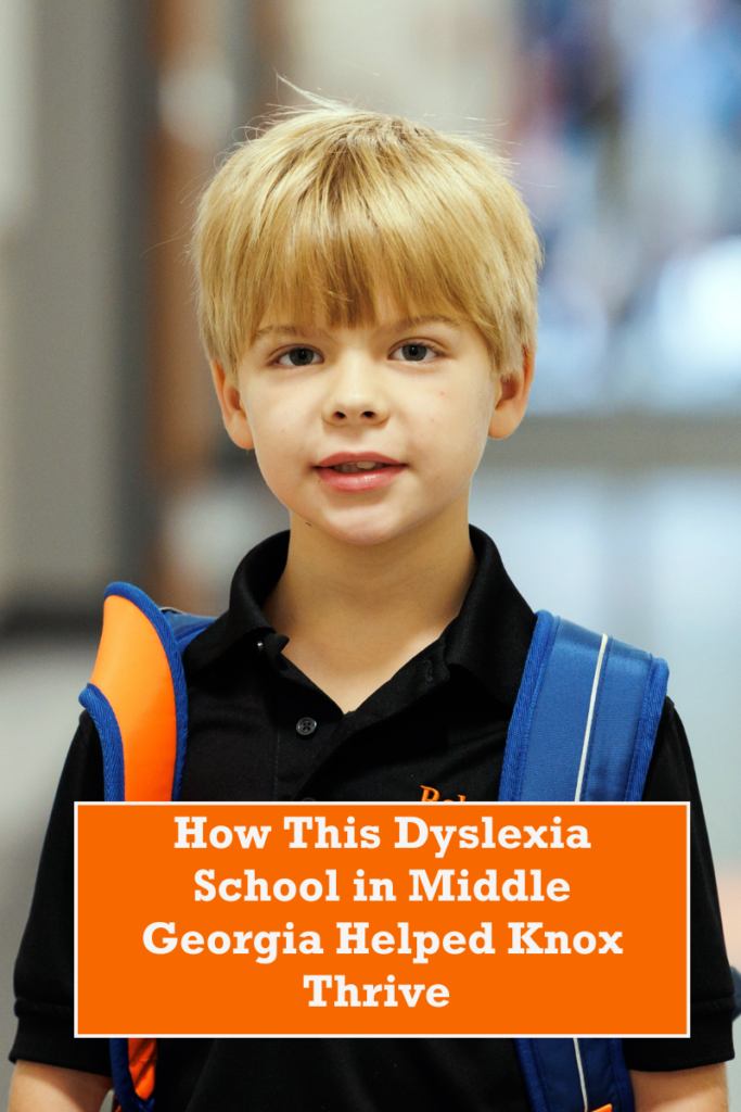 A 2nd grade student walks through the halls of Roberts Academy. Image has text that reads: "How this Dyslexia School in Middle Georgia Helped Knox Thrive."