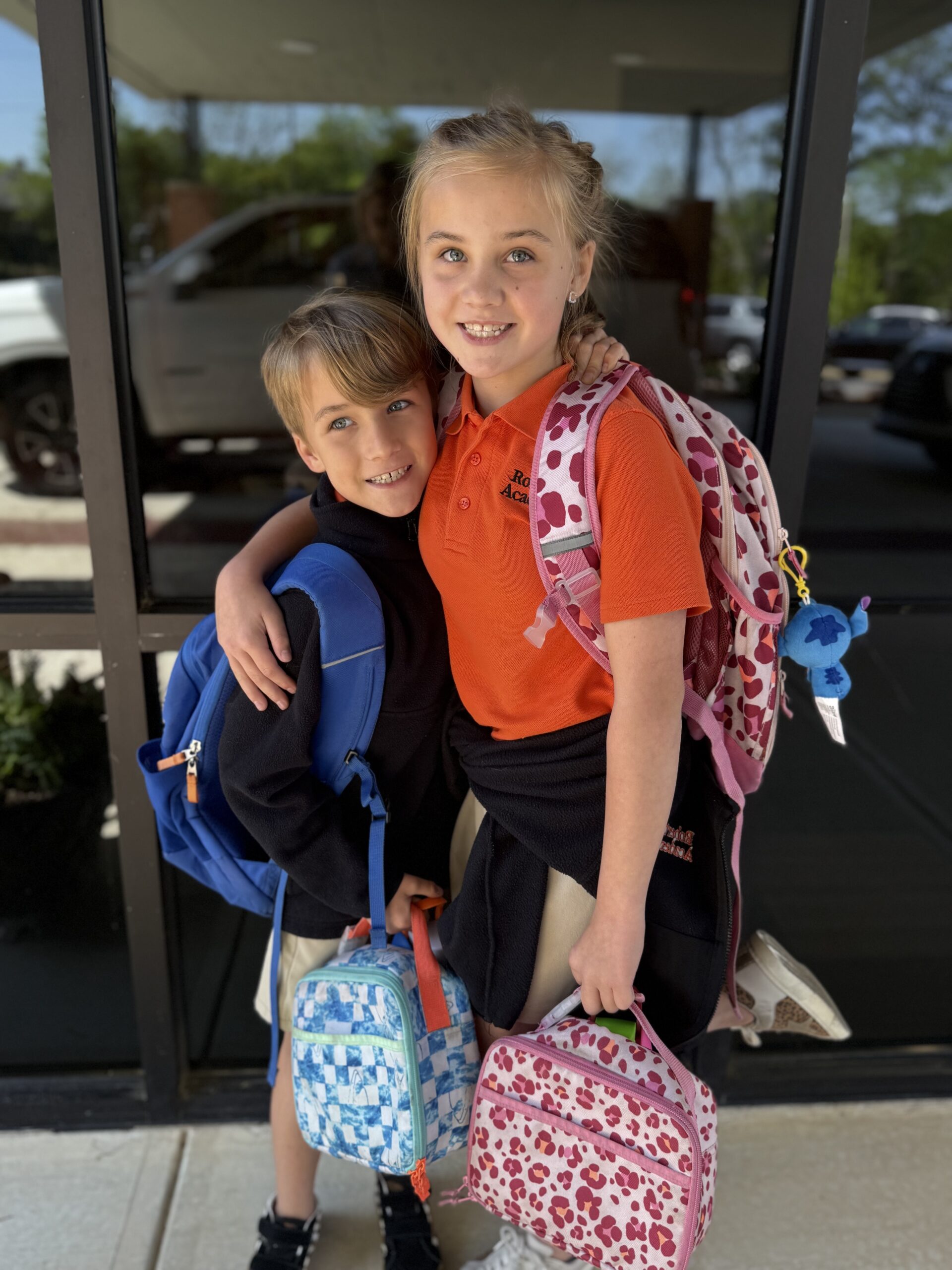 Roberts Academy siblings pose in front of their school in Macon, Georgia
