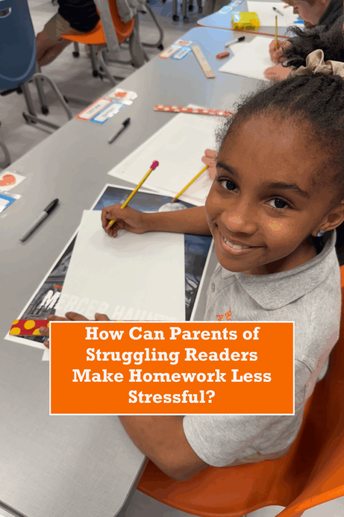 A young student smiles at the camera while holding a pencil and working on an assignment at her desk in a classroom. An orange text box on the image reads, "How Can Parents of Struggling Readers Make Homework Less Stressful?