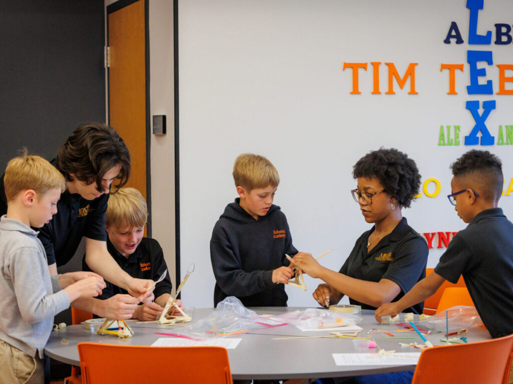 Mercer students working with students at Roberts Academy